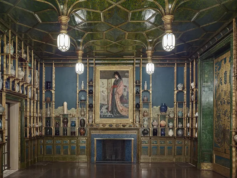 James McNeill Whistler's Harmony in Blue and Gold: The Peacock Room, with gilded peacock murals and shelves of Chinese porcelain, in the Freer Gallery of Art