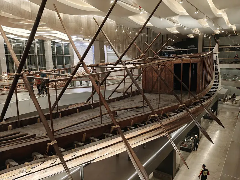 Khufu's solar barque on display in the Boats Museum at the Grand Egyptian Museum