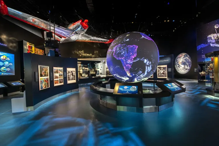 Satellites and objects on display in the One World Connected gallery