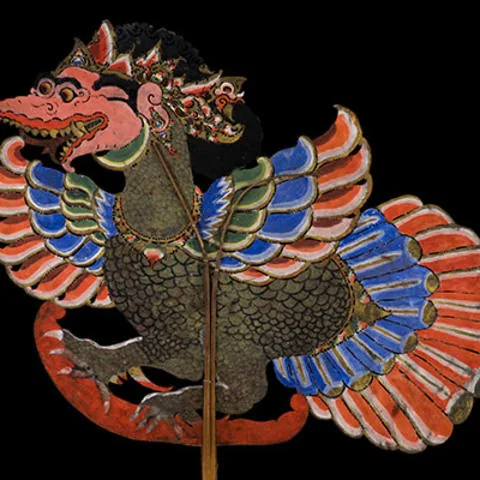 Garuda bird shadow puppet displayed in All the World Is Here at the Peabody Museum