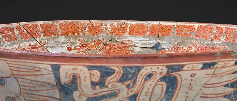 Painted Maya chocolate vessel on display in Encounters with the Americas