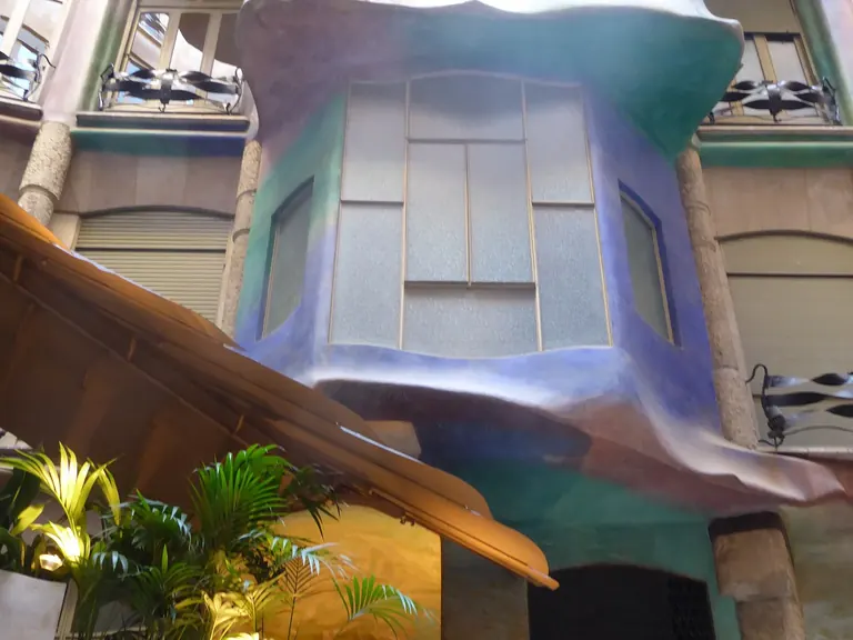 Inner courtyard of Casa Milà with painted walls