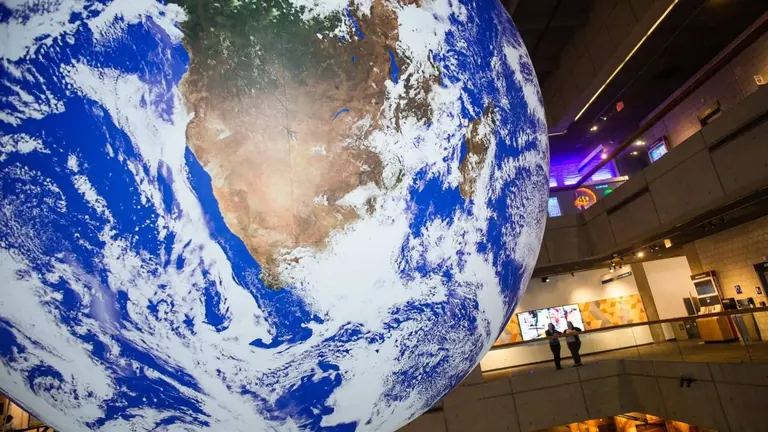 A view of Luke Jerram's Gaia globe from Level One in the Museum's Blue Wing