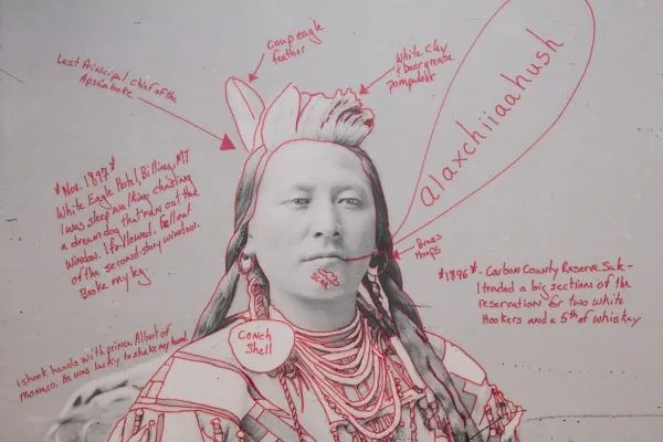 Wendy Red Star artwork: a historic black-and-white portrait of an Apsáalooke chief overlaid with the artist's handwritten red annotations