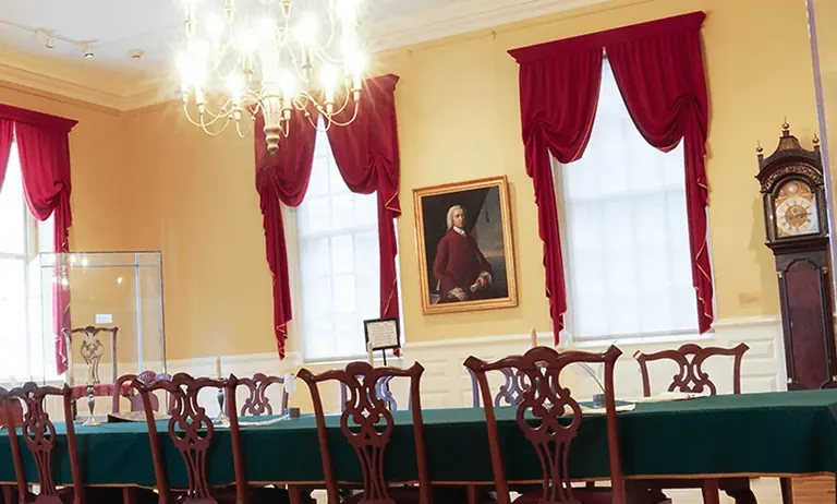 The restored Council Chamber on the second floor of the Old State House, with the Royal Governor's chair and Council table