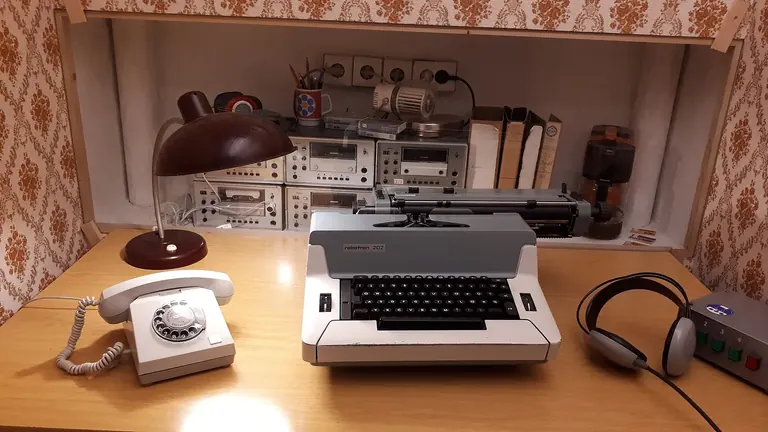 Stasi listening room in the DDR Museum with TG7127 tape recorders used for phone tapping