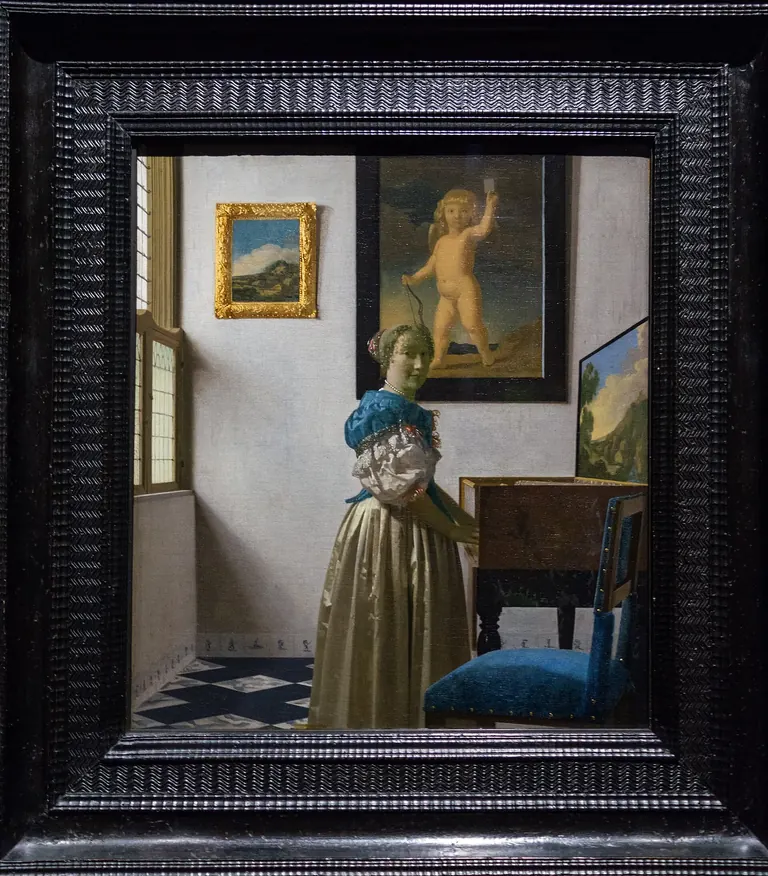 Emakume gaztea birjinal baten aurrean zutik (Young Woman Standing at a Virginal), Johannes Vermeerrena