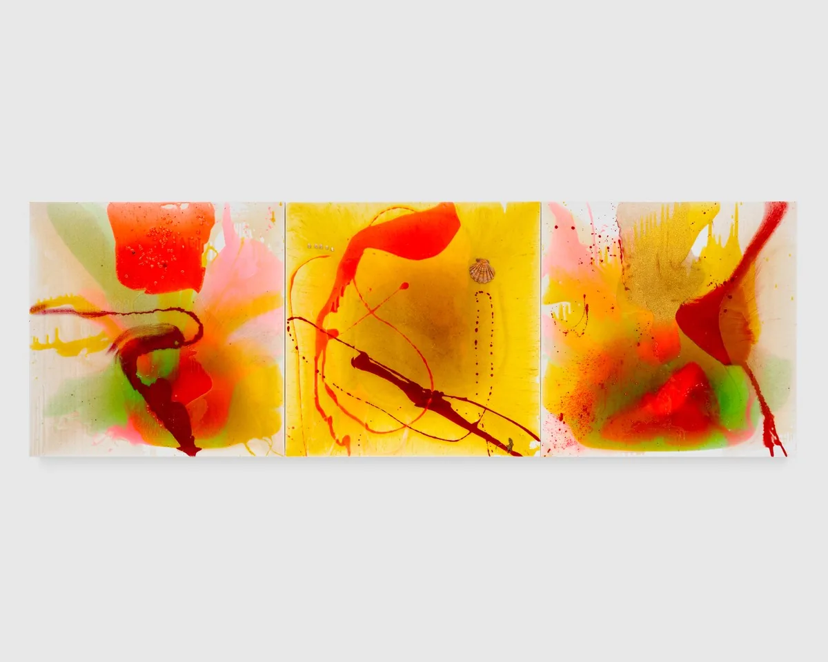 Triptych by Helen Marden composed of three white canvases with pools of orange, yellow, green, and pink resin and a seashell affixed to the center canvas