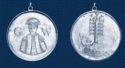 Medalla de plata gravada amb George Washington de cara, vestit amb uniforme militar, i una figura indígena americana asseguda al costat d’una columna