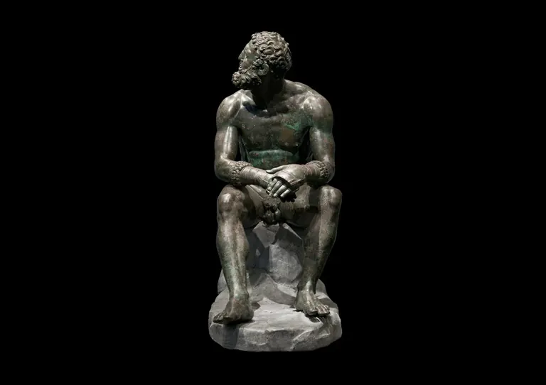 Statue en bronze du Boxeur au repos dans la galerie des bronzes et des ivoires du Palazzo Massimo