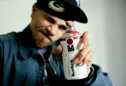 GOLDIE spraying a can of Buntlack, Beyond the Streets at Saatchi Gallery