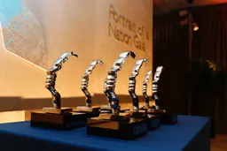 Gold Portrait of a Nation award trophies shaped as a face in profile
