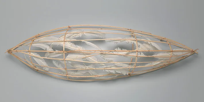 Truman Lowe's Feather Canoe, made from peeled willow saplings, feathers and copper wire