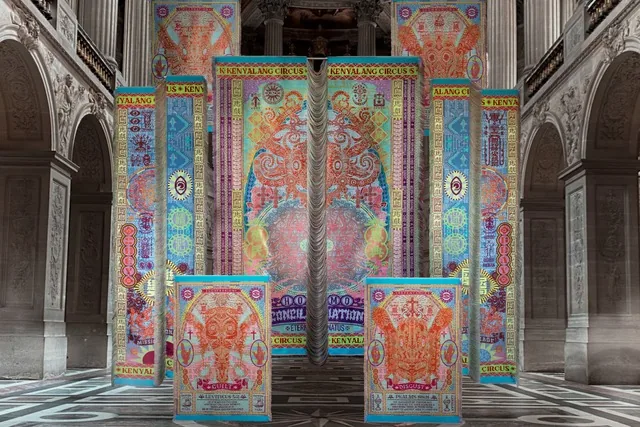 Large woven textile hangings by Marcos Kueh in bright orange, blue and pink installed in a stone hall