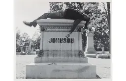Rashid Johnson, Self Portrait laying on Jack Johnson's Grave (2006)