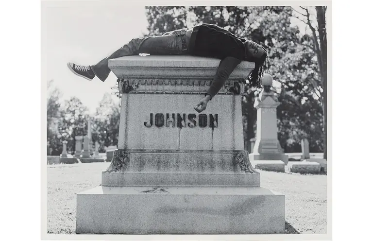 Rashid Johnson, Self Portrait laying on Jack Johnson's Grave (2006)