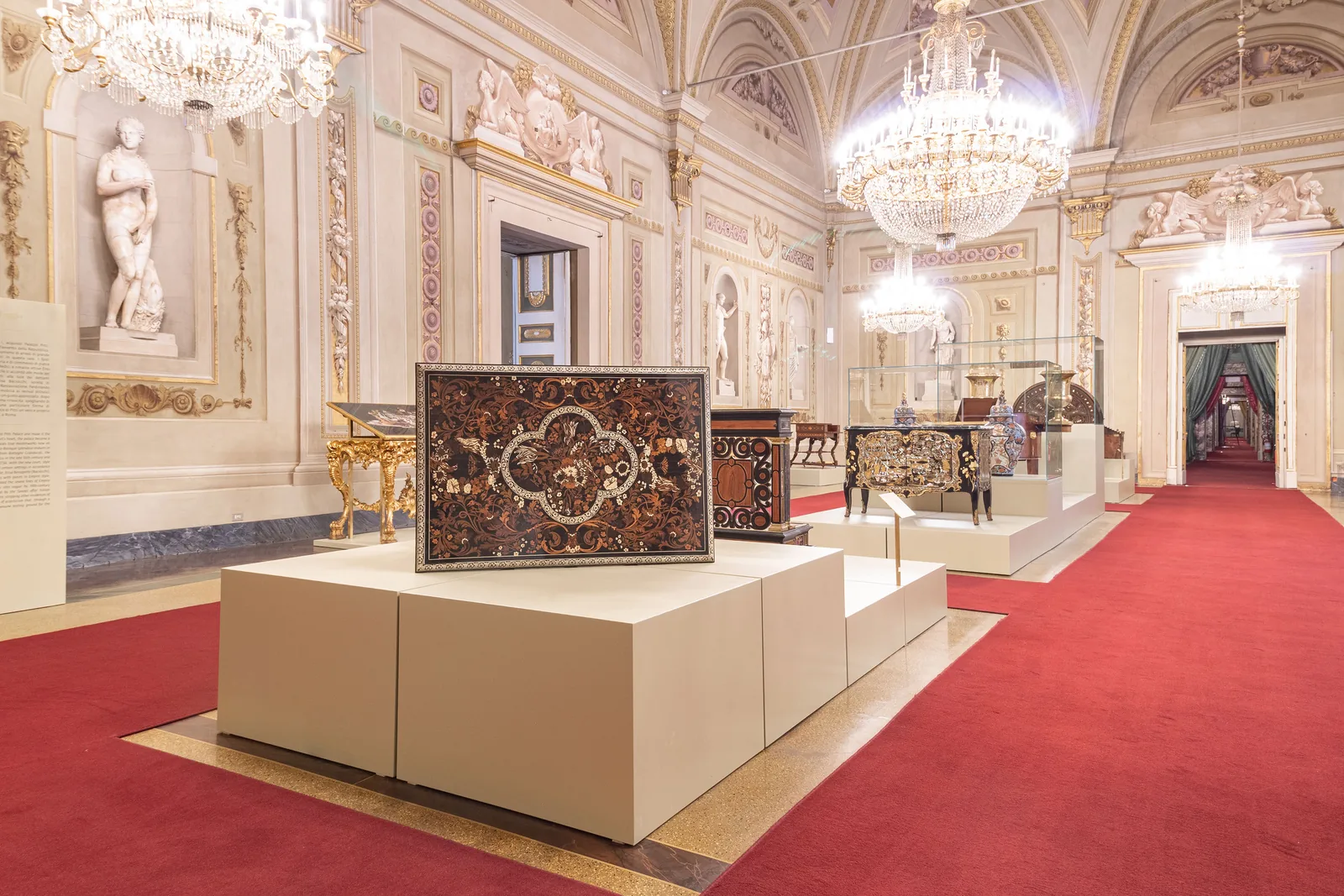 The Hall of Niches in the Palatine Gallery at Pitti Palace displaying royal furniture from the Medici, Lorraine and Savoy dynasties