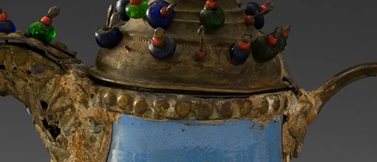 Detail of an elaborate Syrian coffee pot in Resetting the Table