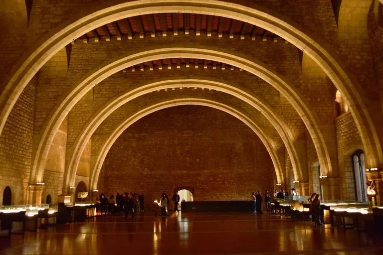 Interior of the Saló del Tinell with its great stone arches