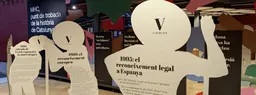 Cut-out silhouette panels with timeline texts in the exhibition Visibles