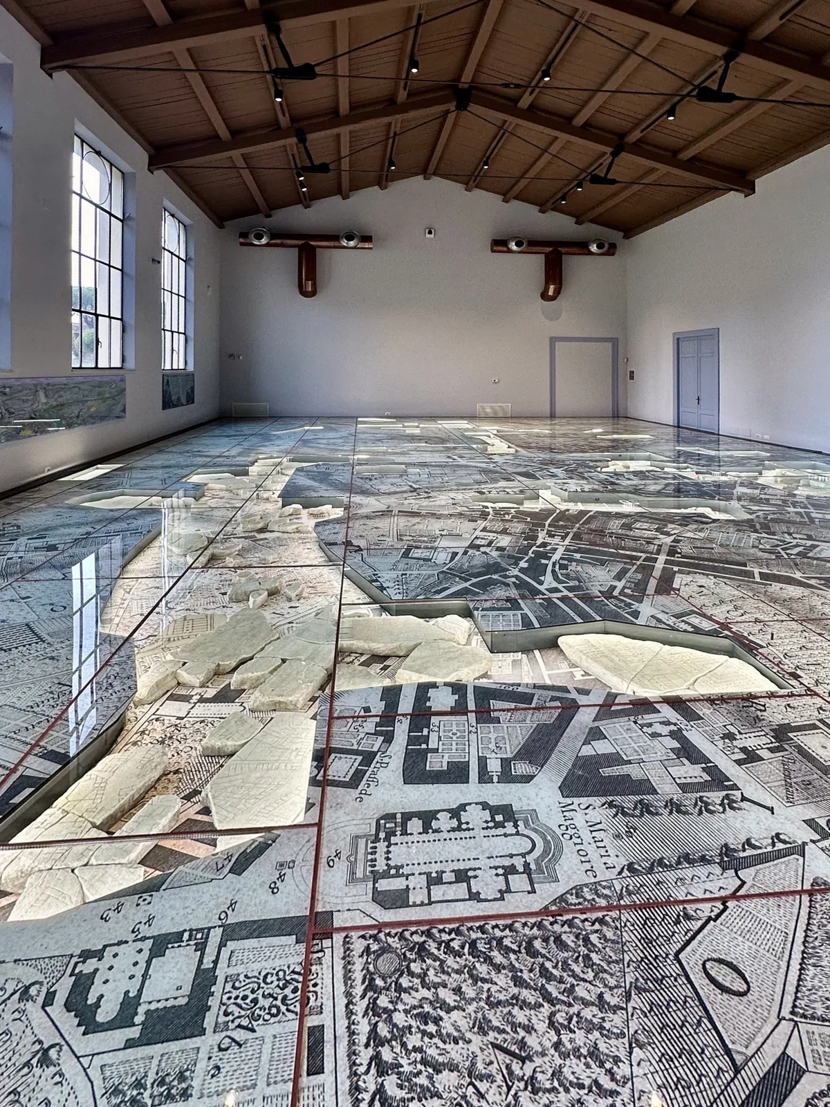 Interior of the Museo della Forma Urbis showing marble map fragments on the floor, Rome