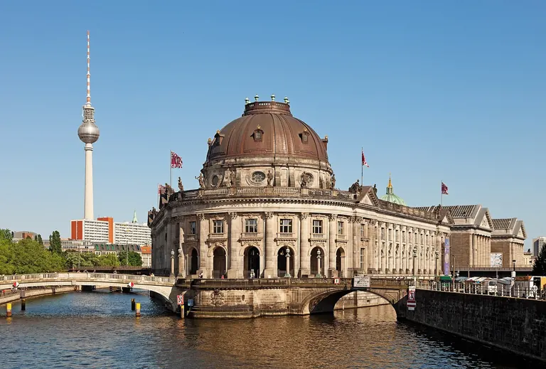 The domed Bode-Museum at the tip of Museum Island on the Spree, with the Berlin TV Tower behind