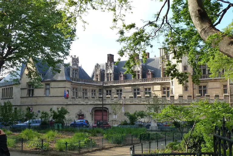 The flamboyant Gothic facade of the Hôtel de Cluny, home to the Musée de Cluny in Paris