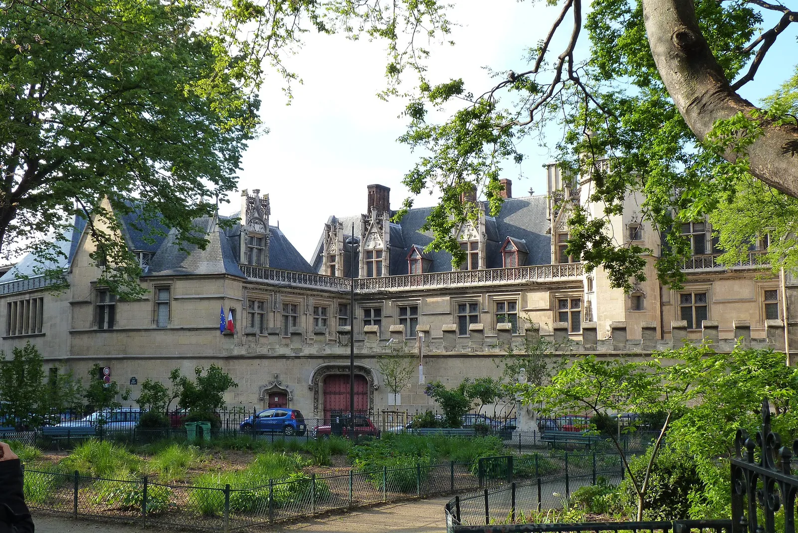 The flamboyant Gothic facade of the Hôtel de Cluny, home to the Musée de Cluny in Paris