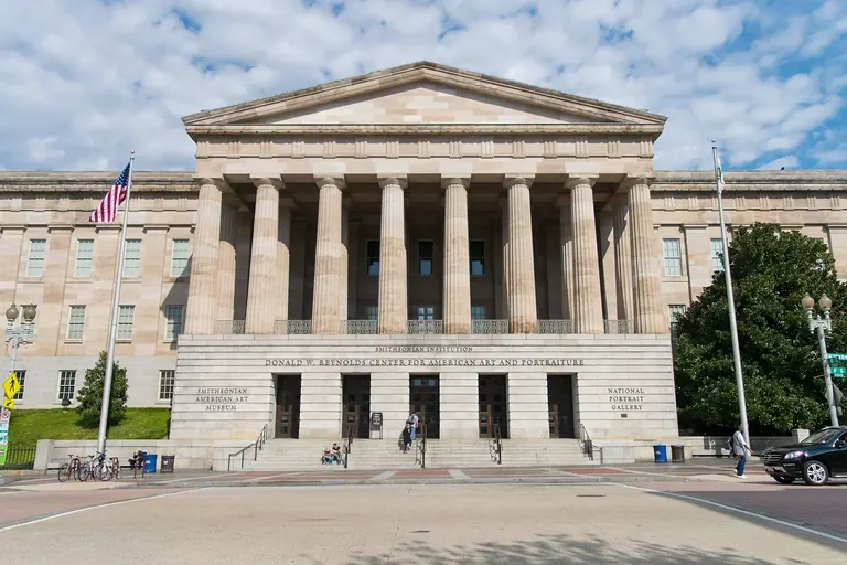 The Greek Revival south (F Street) portico of the Old Patent Office Building, home of the National Portrait Gallery in Washington, DC