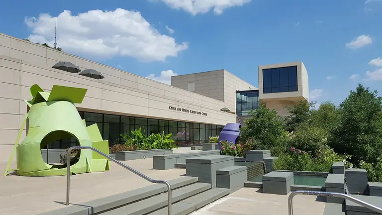 Exterior of the Cyrus and Myrtle Katzen Arts Center at American University, with sculptures in the terraced garden in front