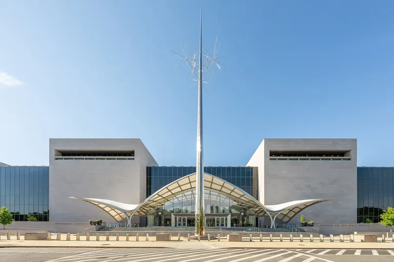 The newly refaced National Mall building of the National Air and Space Museum, showing the glass portico entrance on Jefferson Drive and the Ad Astra sculpture