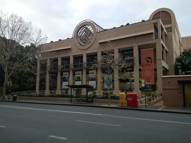 The heritage sandstone facade of the State Library of New South Wales on Macquarie Street, Sydney