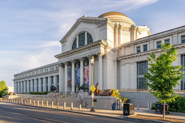 Exterior of the Smithsonian National Museum of Natural History on the National Mall, its domed Beaux-Arts rotunda above a columned portico