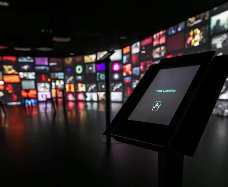 Visitors using the Film Catcher installation at Eye Filmmuseum
