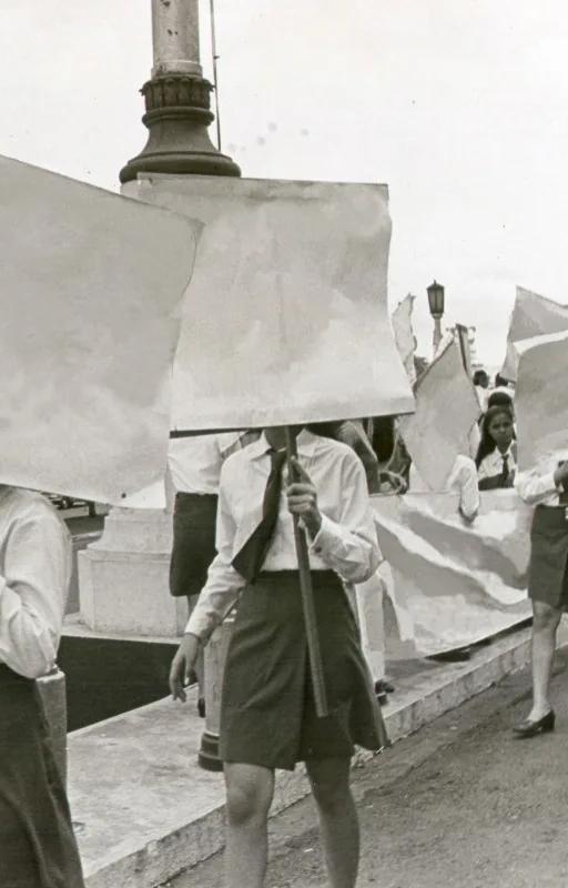 Kiri Dalena, archival photograph of young women with erased protest placards