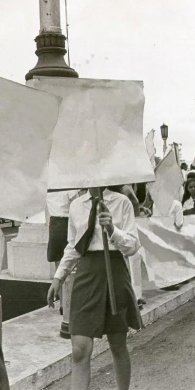 Kiri Dalena, archival photograph of young women with erased protest placards