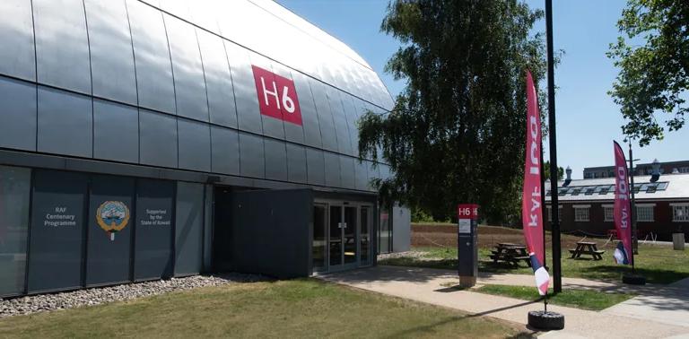 Exterior of Hangar 6 at RAF Museum London, home to The Age of Uncertainty exhibition
