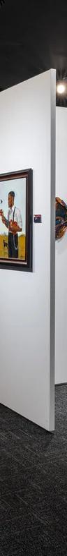 Visitors in the Black Creativity Juried Art Exhibition galleries at the Griffin Museum of Science and Industry