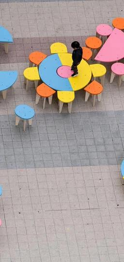 Colourful modular plywood furniture installation by Päivi Raivio at the Barbican