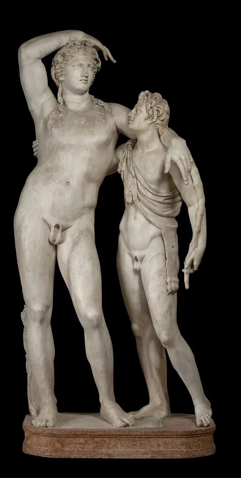 Marble statue group of Dionysus leaning on a satyr
