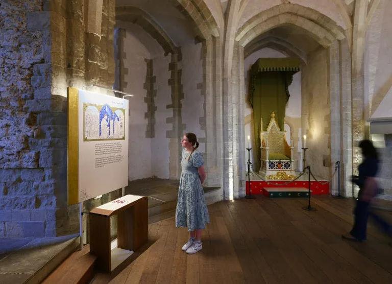 Interior of the Wakefield Tower with new displays, a replica throne and a candelabra, in the Medieval Palace at the Tower of London