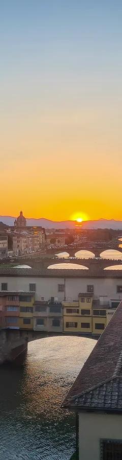 Ponte Vecchio bridge over the Arno at night, along the route of the Vasari Corridor in Florence