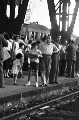 Federico Garolla photograph of Ferragosto at Milan station, exhibition banner