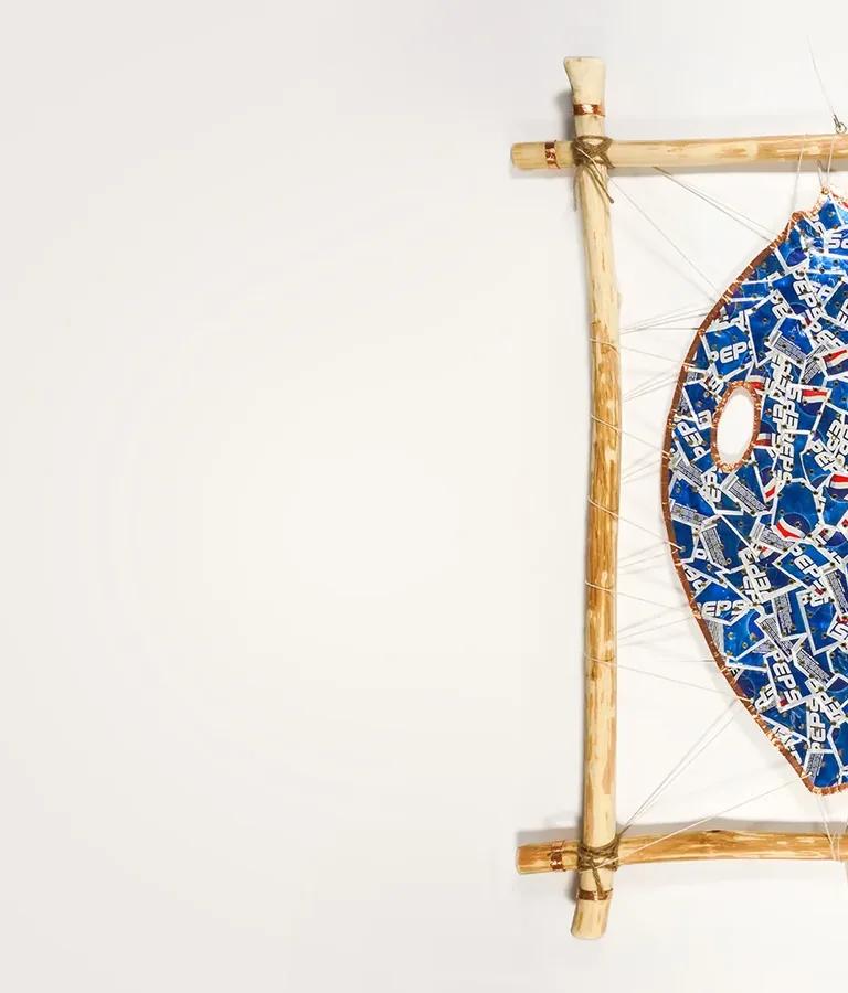 Michael Massie, “pop” art in suspension, 2025, aluminum, wood, copper, string/gut. Image courtesy of Fehely Fine Arts, photo by Renzo Fernandez.