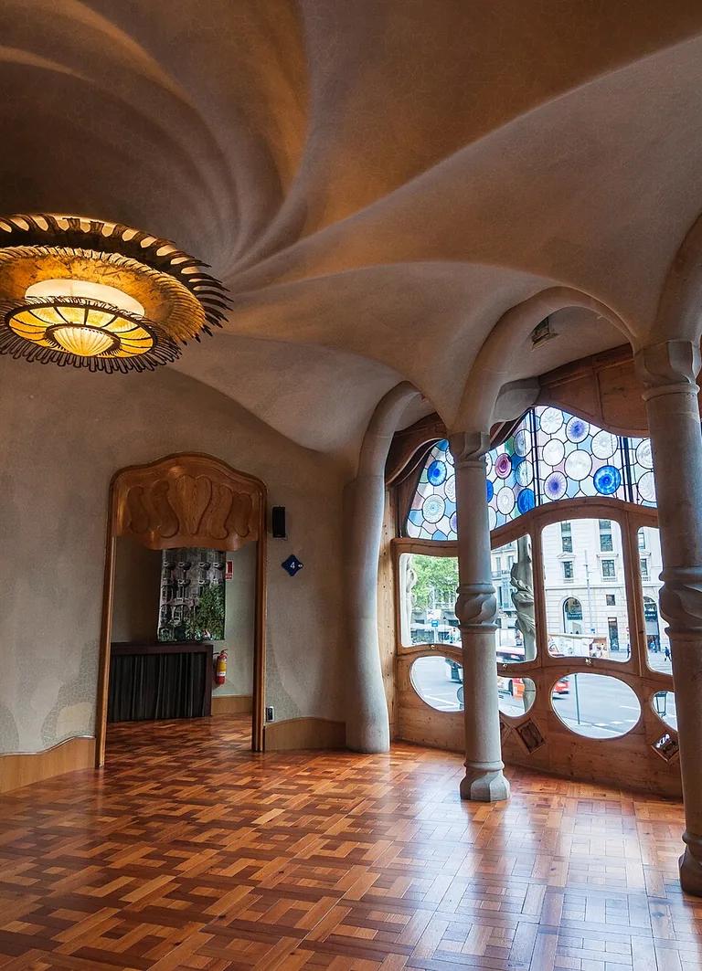 Main salon on the Noble Floor of Casa Batlló, with its swirling ceiling and stained-glass windows
