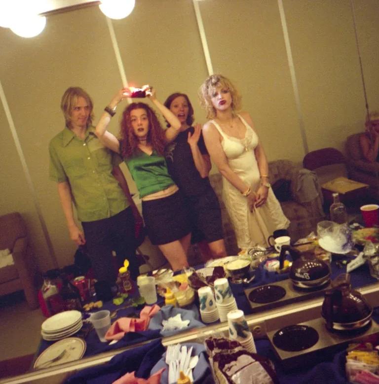 Melissa Auf der Maur, Self-portrait in mirror with Hole, Lollapalooza backstage, USA, 1995