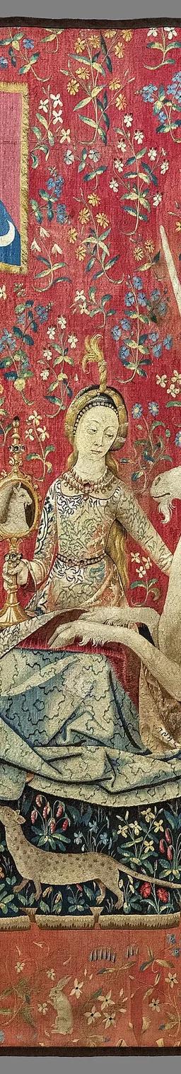 The Sight panel of the Lady and the Unicorn tapestry, the unicorn gazing into a mirror