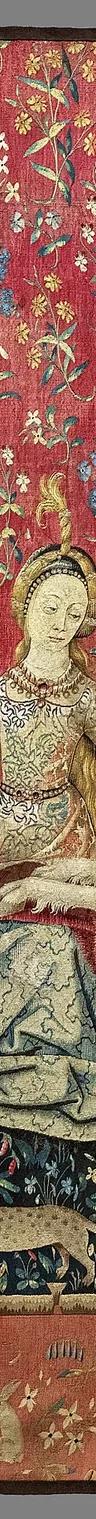 The Sight panel of the Lady and the Unicorn tapestry, the unicorn gazing into a mirror