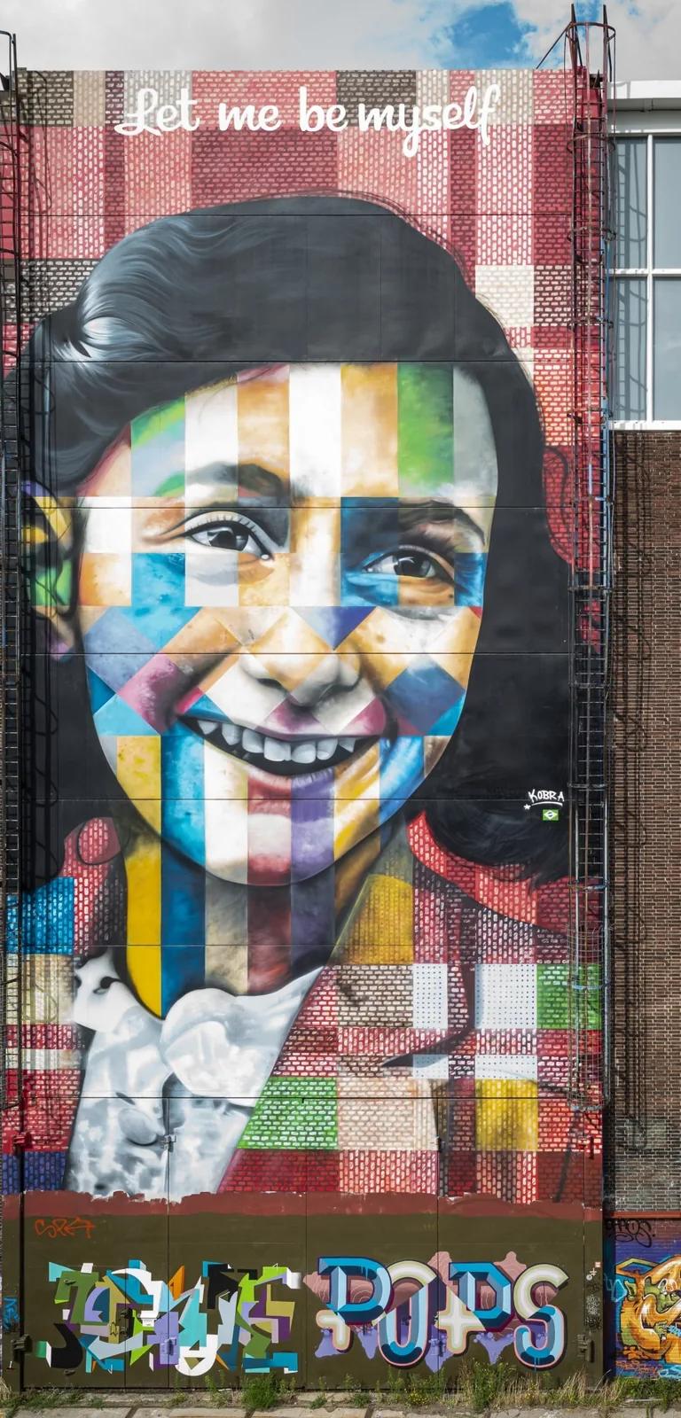 Eduardo Kobra's Anne Frank mural 'Let Me Be Myself' on the exterior of STRAAT Museum