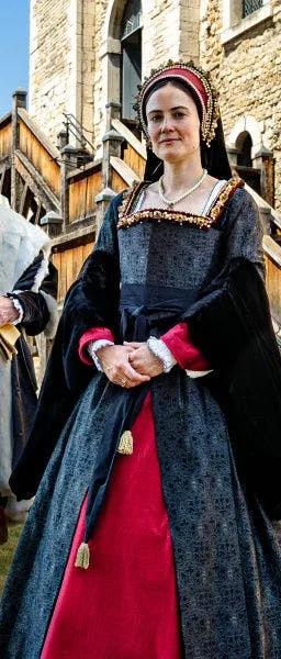Performer dressed as Queen Anne Boleyn greeting visitors at the Tower of London